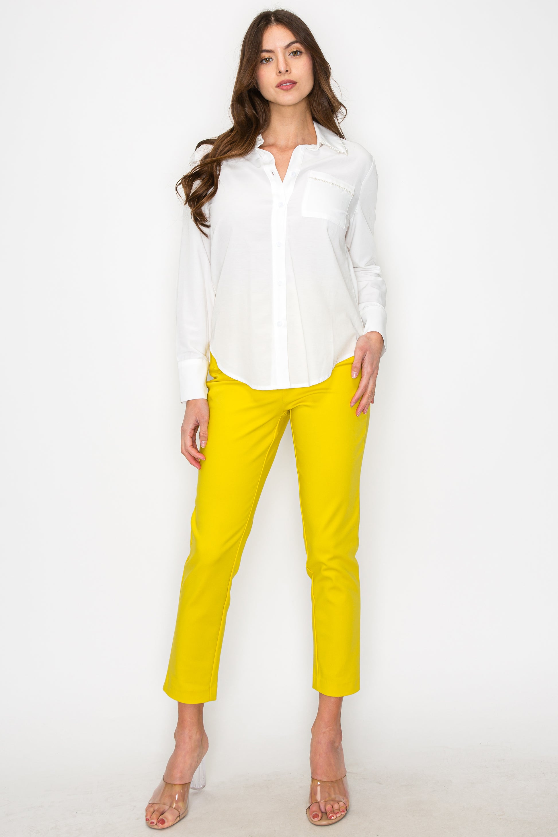 • SKU: T5232 • S-M-L • Hand wash only • Womens long sleeved has collared neckline,gather at the waist, and a buttoned design.    • This garment is characterized by long sleeves and a collar, reminiscent of a typical long-sleeved shirt or formal attire.  • It features a decorative bead embellishment on the left chest pocket, adding a unique touch to the design. The best price and wholesale w/ onenmoreusa.com