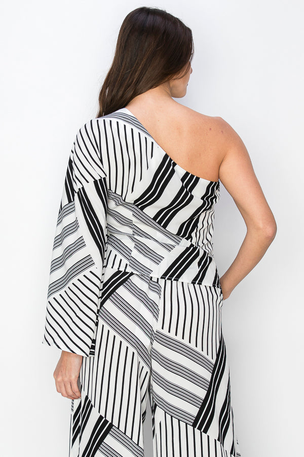 • SKU: T5366, P2221-SET • S-M-L (2-2-2) • Hand wash only •This garment is a top featuring two diagonal stripes with distinct prints, and it is designed asymmetrically with one side intended to be worn off the shoulder. • This is a SET, No Split Sale on top & bottom Note: 6 Pcs of Top in a pack & 6 Pcs of Pants in a pack are separated . high quality & wholesale price w/ onenmoreusa.com